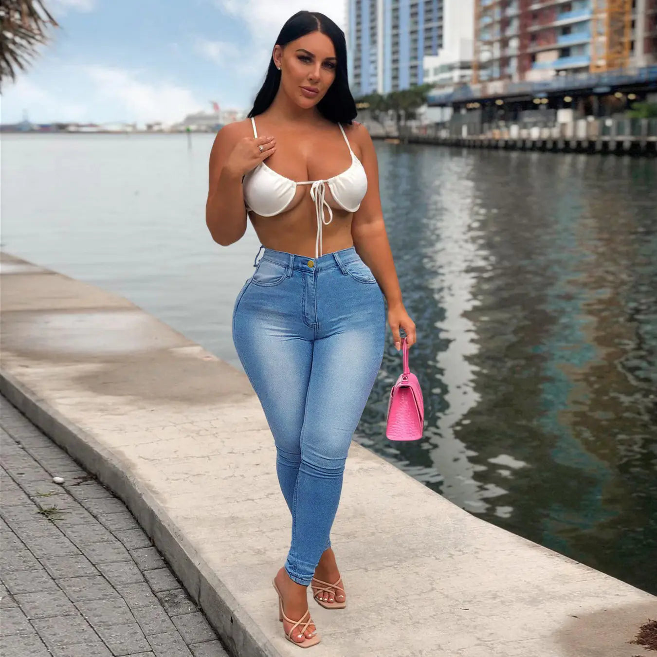 Curvy High Rise Skinny Jeans with Plicated Hem