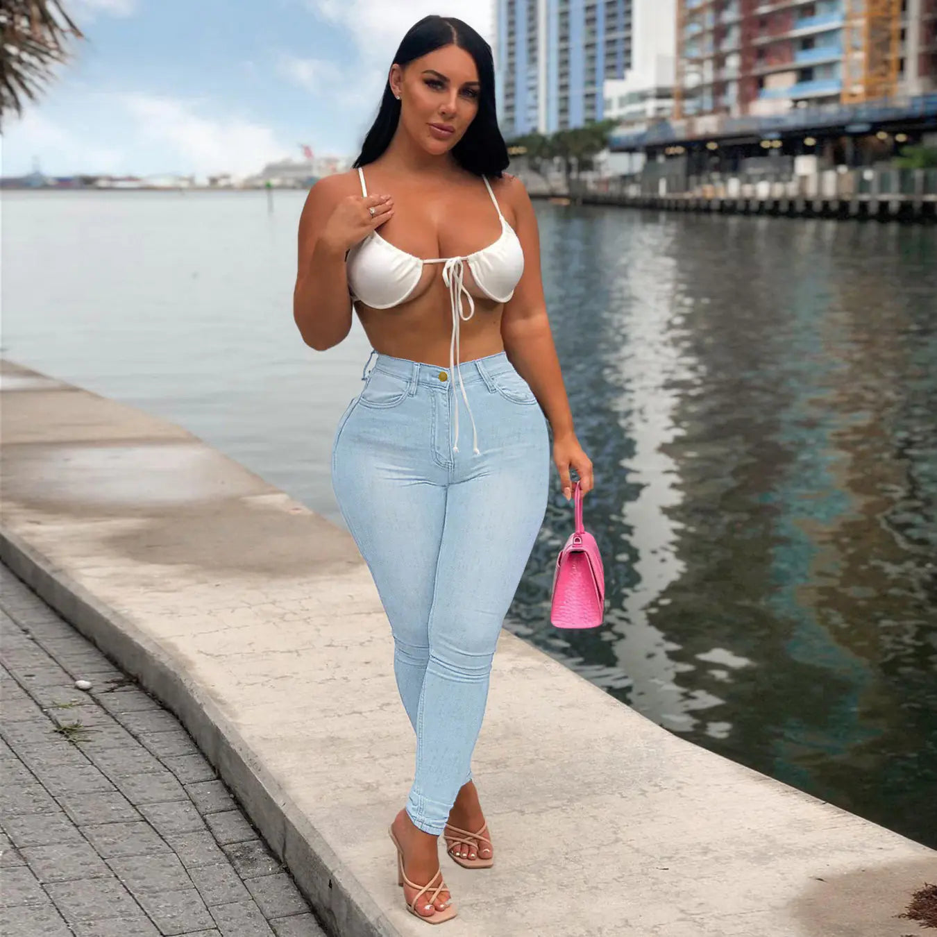 Curvy High Rise Skinny Jeans with Plicated Hem